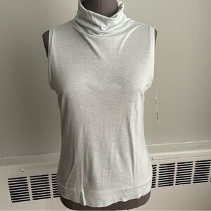realities icy blue colored sleeveless turtleneck. Size Small